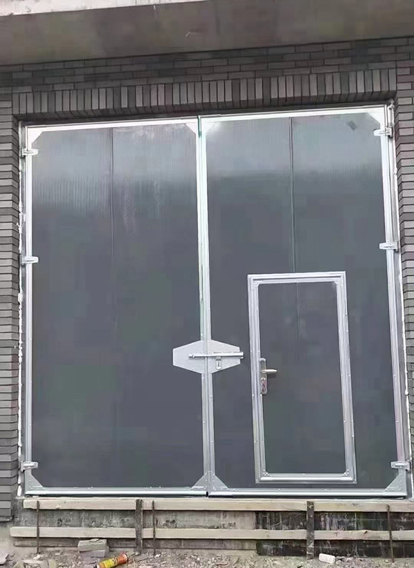 克拉玛依工业平开门在大型设备制造车间的应用实例